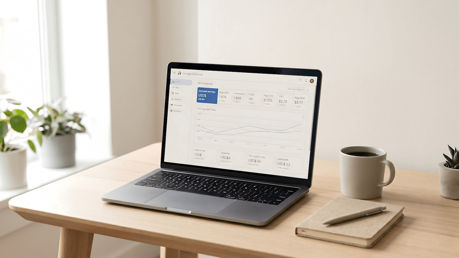 Google AdSense approval dashboard on a laptop in a home office setup